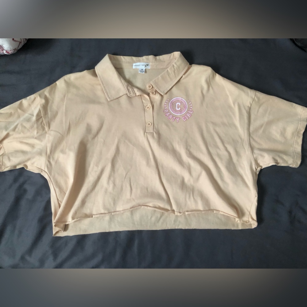 size small, tan color, crop top. barely used w/ no stains.